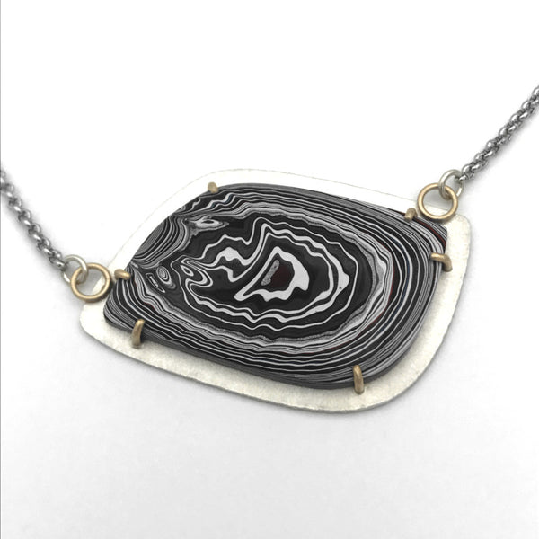 Fordite Pendant Silver and Gold Necklace No 2 by tkmetalarts, sterling silver setting with 18k gold prongs, comes on an 20 to 22 inch chain, multicolor pattern.
