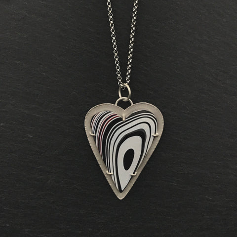 Fordite Heart Shaped Pendant Necklace 7 by tkmetalarts on sterling silver setting, comes on an 18 to 20 inch chain, multicolor off-centered concentric pattern